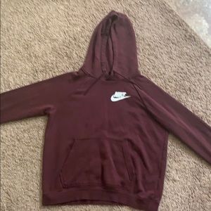 Maroon Nike hoodie sweatshirt in size medium.